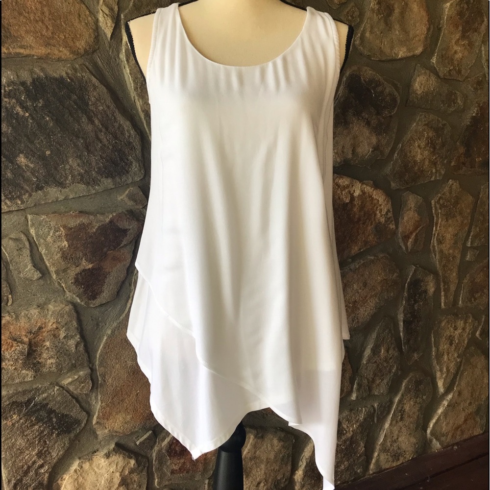 Ethereal ivory tank with handkerchief hem